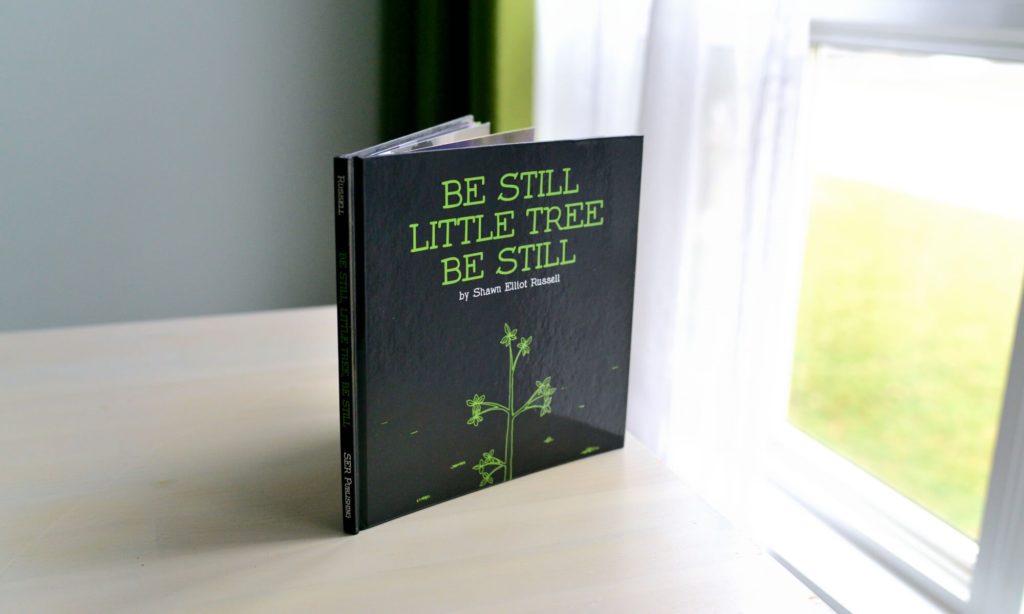 The book that explains mindfulness to children, "Be Still Little Tree, Be Still" by: Shawn Elliott Russell