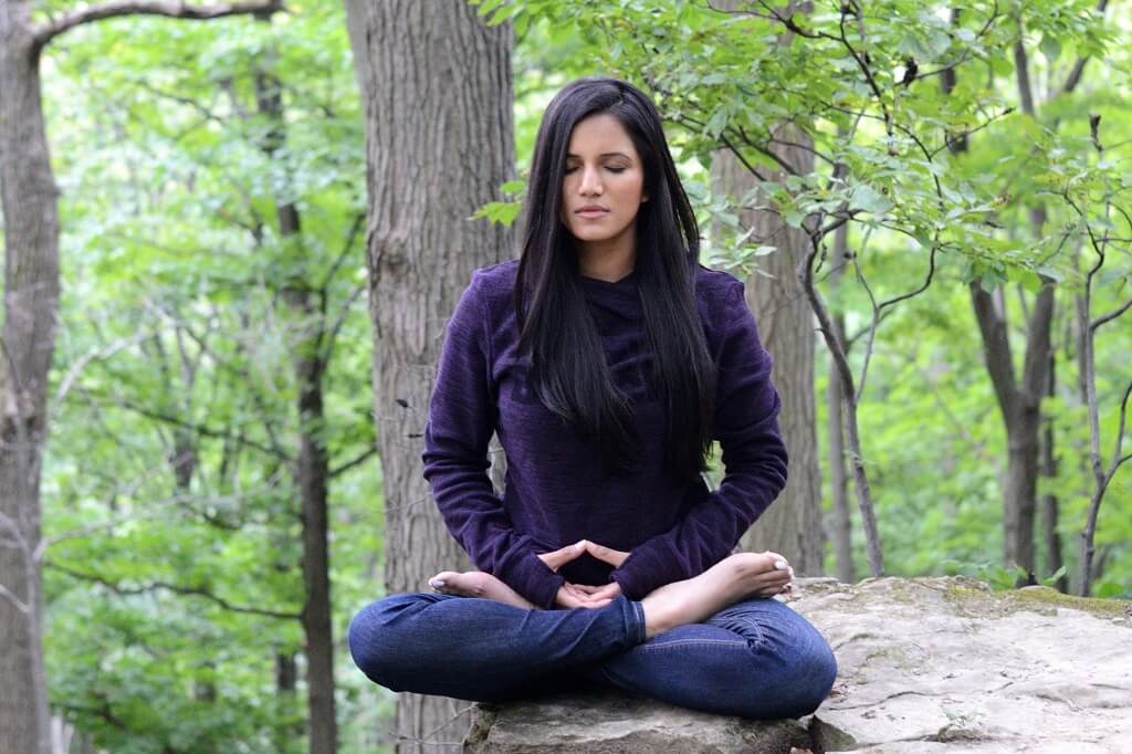 Meditating Outdoors. Tapping into nature's spiritual presence.